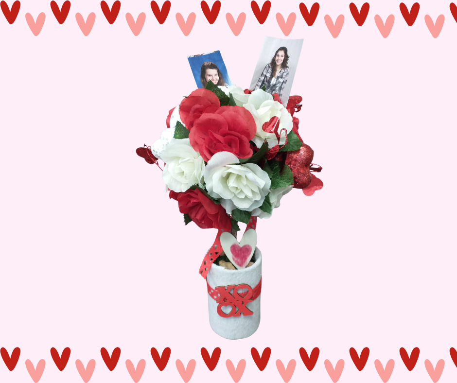 Pink background with hearts on top and bottom with an example of the topiary 